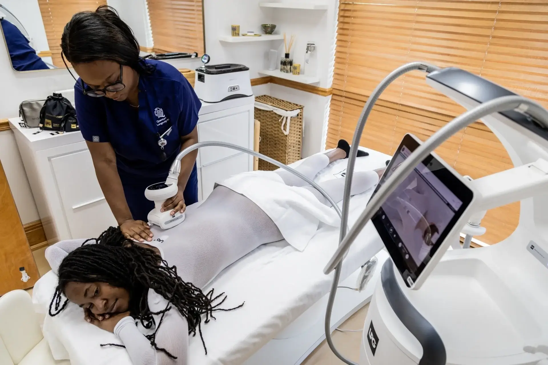 Spa treatment with advanced beauty equipment.