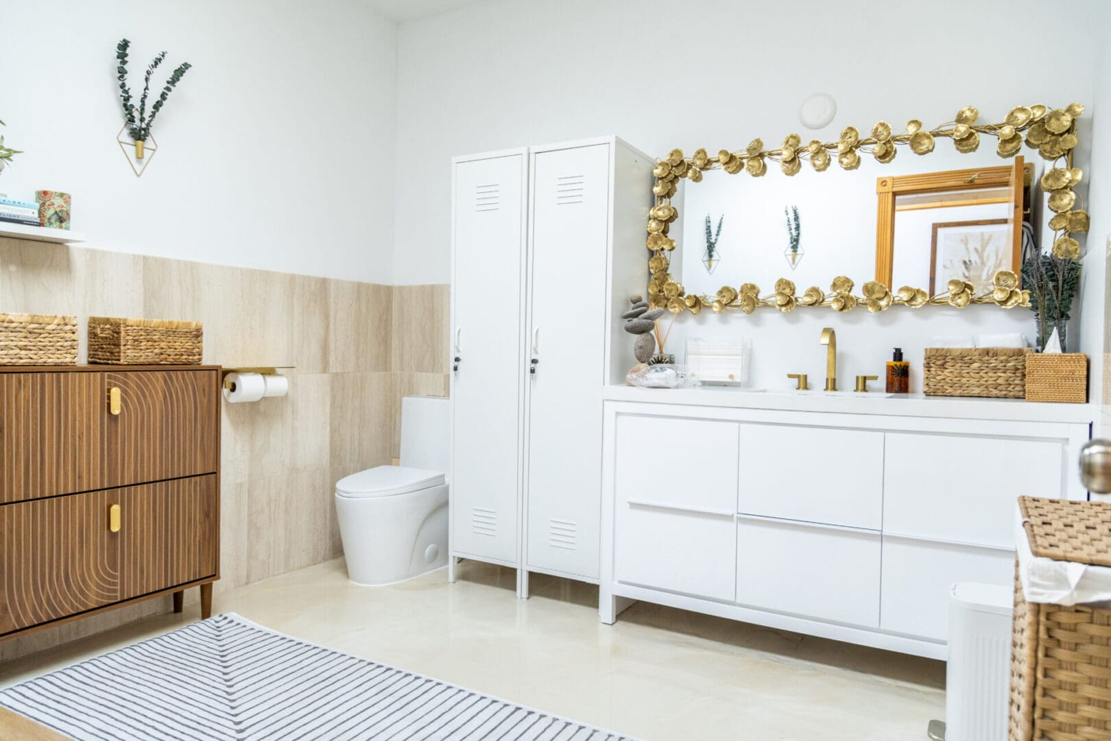 Modern bathroom with white and wooden decor.